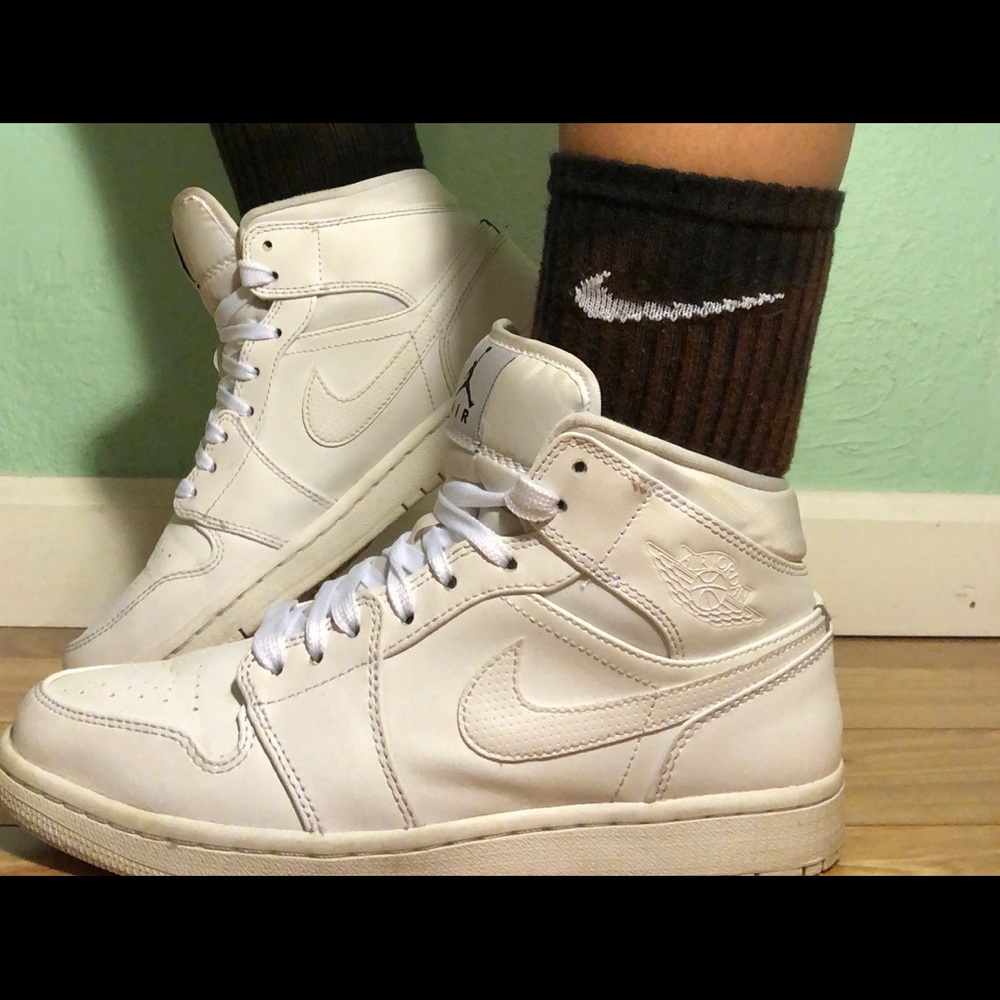 All white Jordan 1s